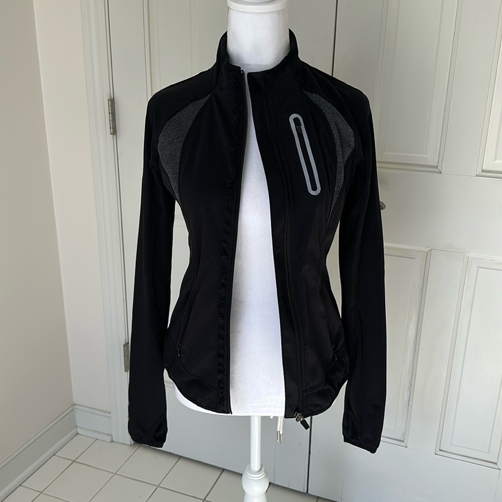 Athleta full zip jacket. Size extra small. Black and gray.